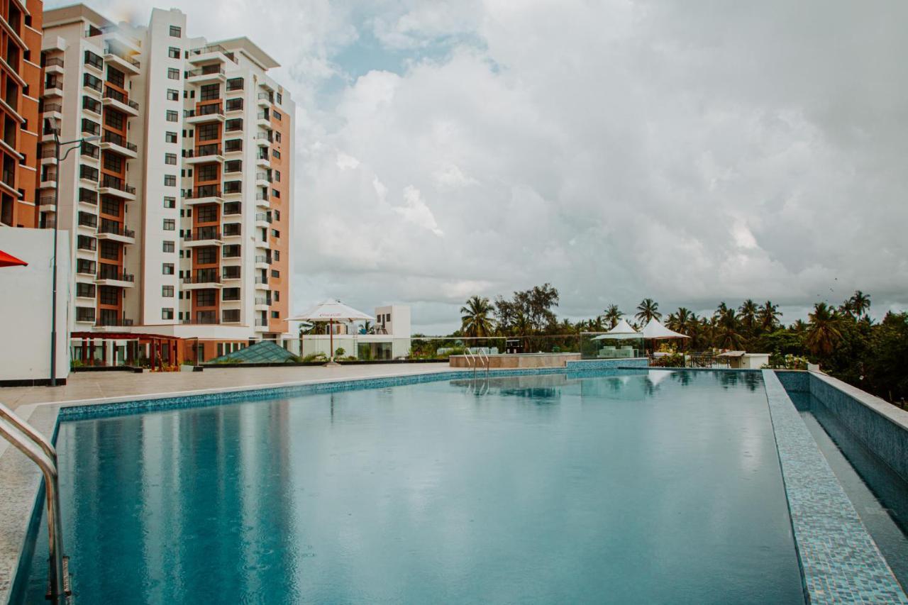 Palm Village Daressalam Exterior foto