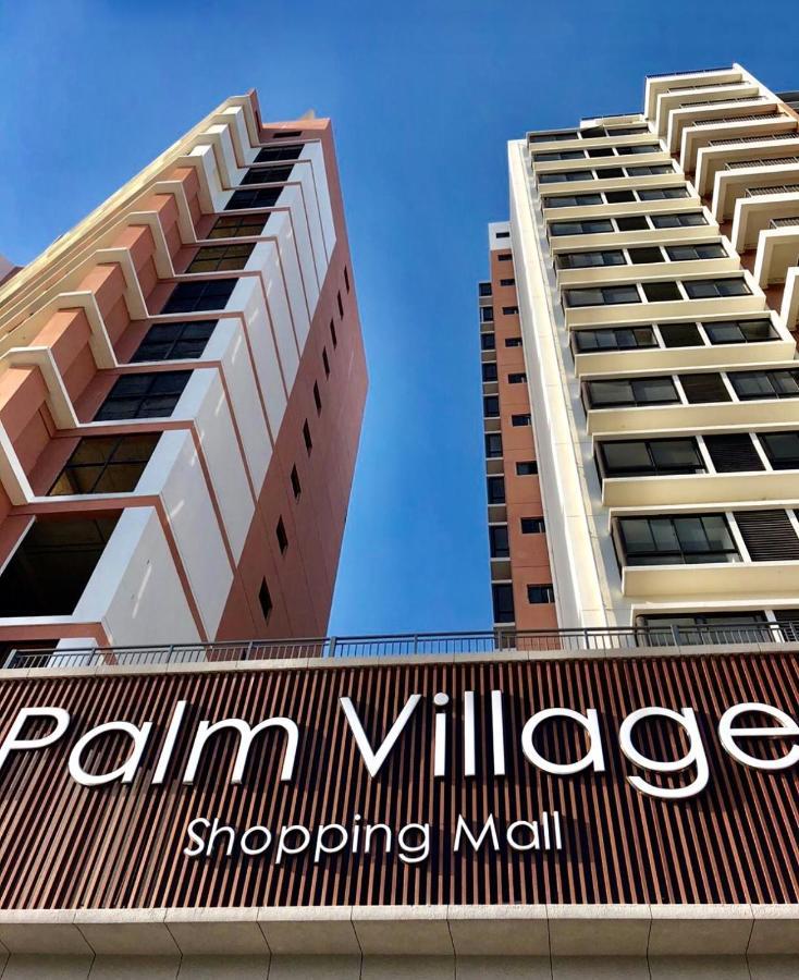 Palm Village Daressalam Exterior foto